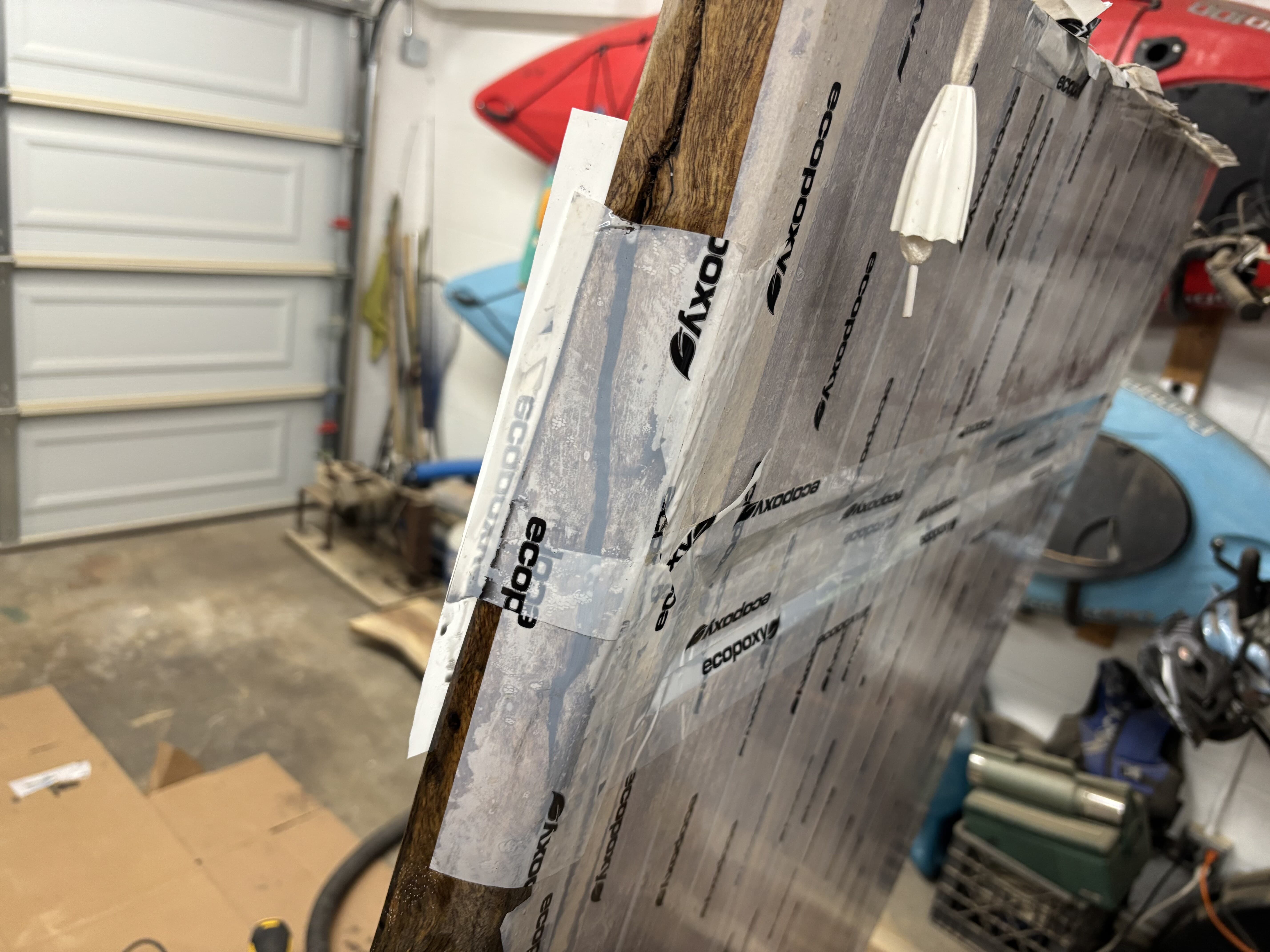 Edge taped and dammed to hold a through-void pour